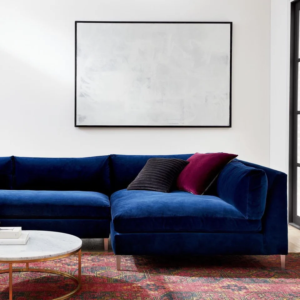 Blue Velvet Sofa Living Room Ideas - Vintage Red Rug with Velvet Blue Sofa	