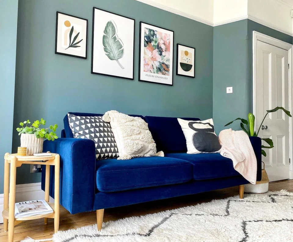 Blue Velvet Sofa Living Room Ideas - A Row of Chic Prints for More Color	