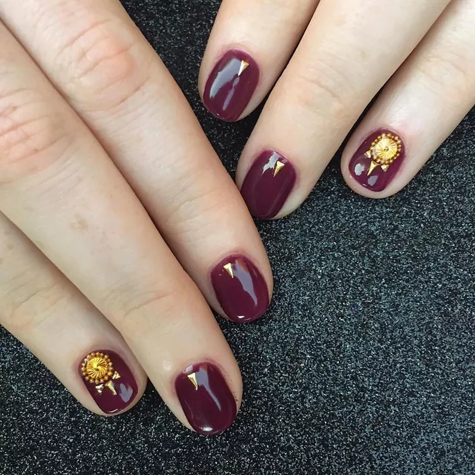 Burgundy Nails with Gold Stickers